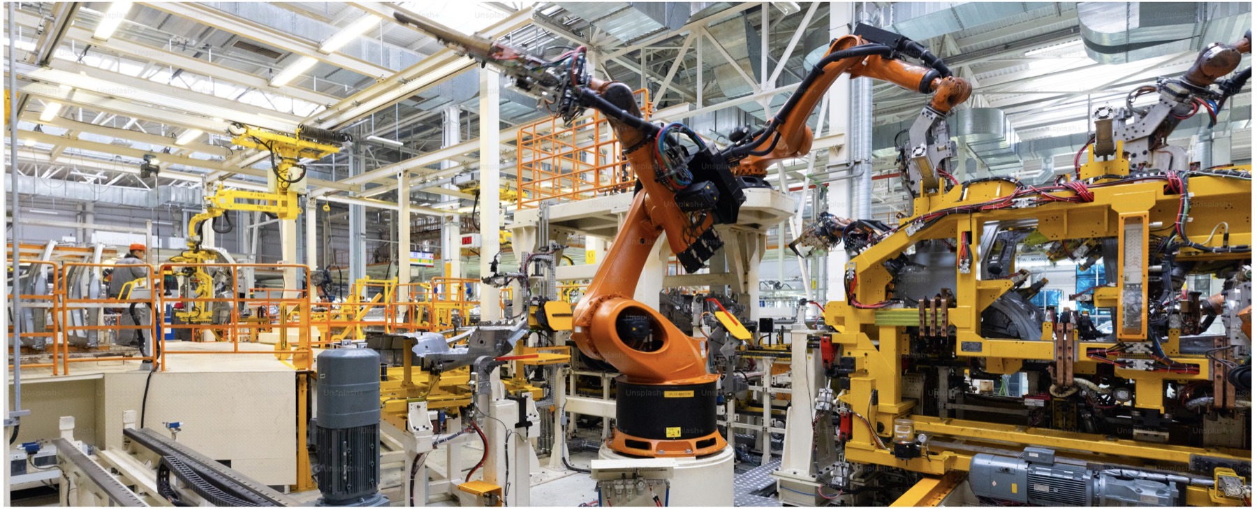 Automated factory line with robotic machinery and production equipment